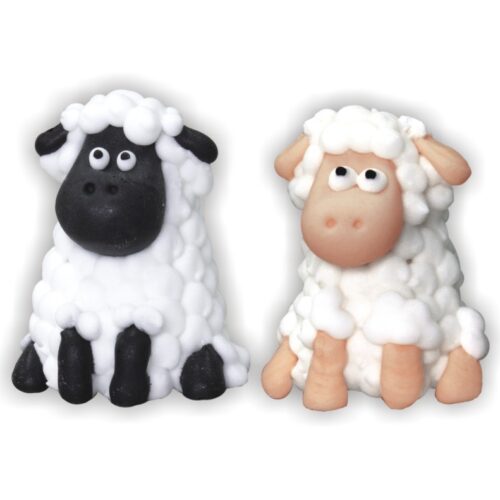 Urocza figurka baranka z czarną twarzą i białym futerkiem z masy cukrowej, idealna dekoracja na tort dla dzieci.